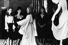 A scene from the 1976 film Salon Kitty Female prostitutes of Salon Kitty, a Nazi brothel during the 1930s and early 1940s.jpg