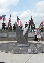 Seven-foot-tall granite monument by Ralph Sirianni at the Town of Tonawanda Veterans Memorial. Memorial V.jpg