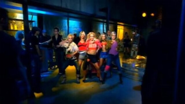 Spears dancing with her friends in the music video