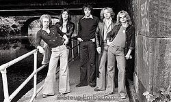 Bandit in 1976. From left to right: Jim Diamond, Cliff Williams, Graham Broad, James Litherland, and Danny McIntosh.