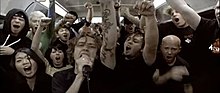 In the music video, Rise Against performs the song inside a crowded subway car. Give It All MV.jpg