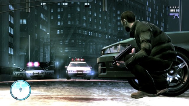 Niko Bellic takes cover behind a car as the police are pursuing him in Grand Theft Auto IV (2008), which is the first game in its series to feature th