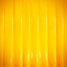 Cover art featuring a yellow curtain