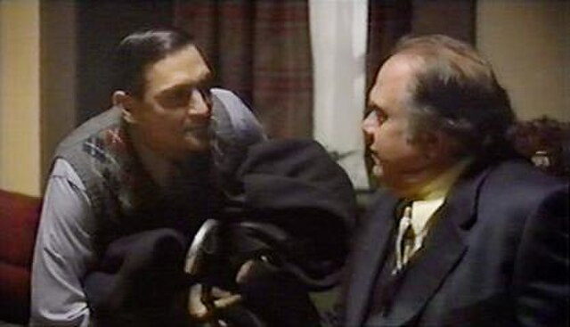 "Will you have some beer?" Saul Panzer (Conrad Dunn) is host to Nero Wolfe (Maury Chaykin) in A&E's 16:9 letterboxed version of "The Next Witness"