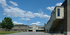 Main entrance, looking east, photographed in June 2006 Pierrefonds Comprehensive High School.jpg