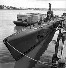 Sargo moored at Mare Island Naval Shipyard, 28 April 1943. Raised metal "188" is seen in faint relief on port bow. White outlines mark recent alterations SargoSS188-MareIsland.jpg
