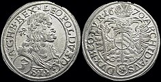 Silver coin of Leopold I, 3 Kreuzer, dated 1670. The Latin inscription reads (obverse): LEOPOLDVS D[EI] G[RATIA] R[OMANORVM] I[MPERATOR] S[EMPER] A[VGVSTVS] G[ERMANIAE] H[VNGARIAE] B[OHEMIAE] REX (reverse):ARCHID[VX] AVS[TRIAE] DVX B[VRGVNDIAE] CO[MES] TYR[OLIS] 1670. In English: "Leopold, by the Grace of God, Emperor of the Romans, always August, King of Germany, Hungary, and Bohemia, Archduke of Austria, Duke of Burgundy, Count of Tyrol, 1670."
