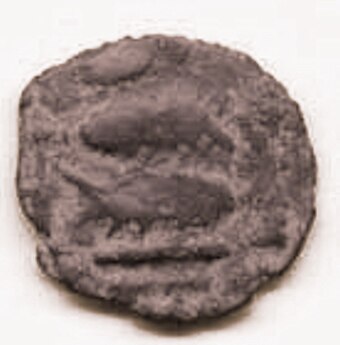 One of the early coins of the Pandyas showing their emblem of the Two Fishes