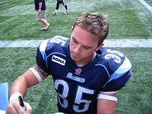 Eiben signing an autograph along the sidelines in 2005. Kevin Eiben in 2005.JPG