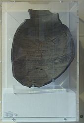Rider Haggard's recreation of the Sherd of Amenartas, now in the collection of the Norwich Castle Museum Rider haggard shard from she.JPG