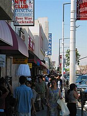 Pedestrians on the Pacific Boulevard shopping district