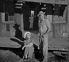 Cinematographer Lucien Andriot used low-level soundstage lighting to create dramatic shadows for the Tuckers' arrival at the farm. The Southerner, 1945, Betty Field and Zachary Scott arrive at farm.jpg