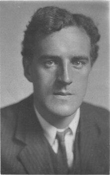 Head-and-shoulders portrait of Robertson in early middle age, in a formal suit, facing the camera