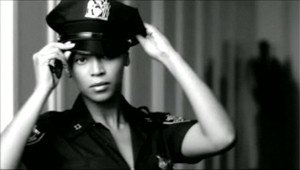 Beyoncé portraying an NYPD officer in the official music video for "If I Were a Boy"