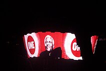 Archbishop Desmond Tutu speaking about ONE in a prerecorded video shown before a U2 performance of "One" during the group's U2 360deg Tour in 2009 Desmond Tutu One 23 Sep 2009.jpg