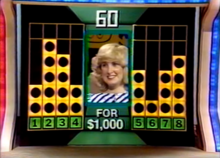 A contestant about to start the Triple Crown bonus round. Hit Man game show Triple Crown.png