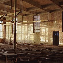 A dilapidated industrial building interior