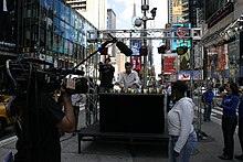 Roy Harter giving a televised alpine bell performance in Times Square, New York Roy harter alpine bells.jpg