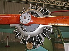 Closeup of the Salmsom 9-cylinder, 120 hp (89 kW), radial engine and the wooden propeller Salsom.jpeg