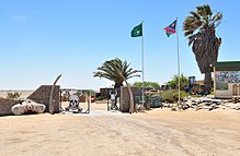 Ugabmund Gate (Ugab River Gate) of the Skeleton Coast National Park; note the skulls-and-crossbones in the gate