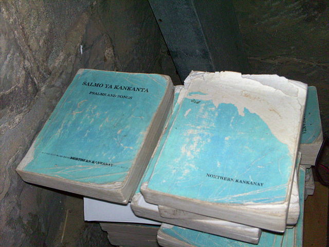 A pile of Kankanay Hymnal in the Church of Saint Mary, an Episcopal Church in Sagada, Mountain Province, Philippines.