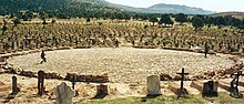 The iconic Mexican stand-off, with Tuco seen on the left, Angel Eyes in the middle, and Blondie on the right. The scene is accompanied by Ennio Morricone's "The Trio". Mexican standoff.jpg