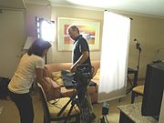 Mylene Moreno (Documentary Producer) and Claudio Rocha (Cinematographer) set up the equipment used for my (Tony Santiago) interview and participation in a PBS documentary on May 8, 2012.