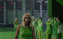 A part of the song's music video in which the people behind Lipa are wearing green shirts with "Fish" and "Kangaroo" written on the back of the shirts.