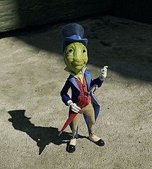 Jiminy Cricket, as seen in Disney's 2022 live-action remake of Pinocchio. JiminyCricket2022.jpg