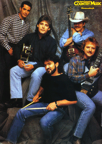 The original lineup as depicted in Modern Screen's Country Music magazine, August 1994. Top, L-R: Stan Thorn, Marty Raybon, Jim Seales. Bottom: Mike McGuire (left) and Ralph Ezell. Shenandoah1994.png