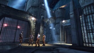 Batman performing a glide kick on a group of enemies from a vantage point, one of the features incorporated from the previous Batman: Arkham games