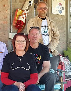 The Dagga Couple (seated) with Jeremy Acton of the Dagga Party Jeremy Acton, Julian Stobbs & Myrtle Clarke.jpg