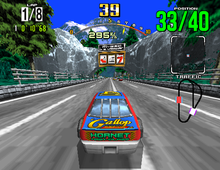 The player driving through the beginner course (arcade version) Daytona USA screenshot.png