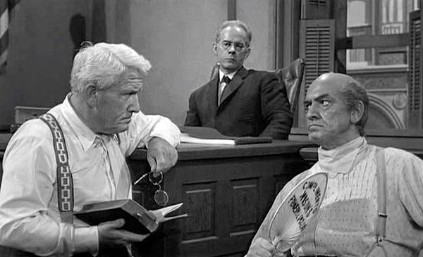 Spencer Tracy, Harry Morgan, and Fredric March during the questioning of Brady by Drummond