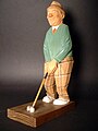 Wood carving of a golfer by Lars Trygg circa 1961