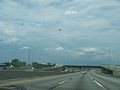 Airplanes fly frequently overhead when you are passing Newark Liberty International Airport on the New Jersey Turnpike, taken in June of 2008.