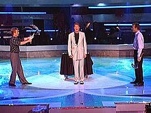 Wee (left) and Morse (right) prepare to throw sickles around David Hasselhoff (center) during the finals of America's Got Talent (season 1) Agt 110 07.jpg