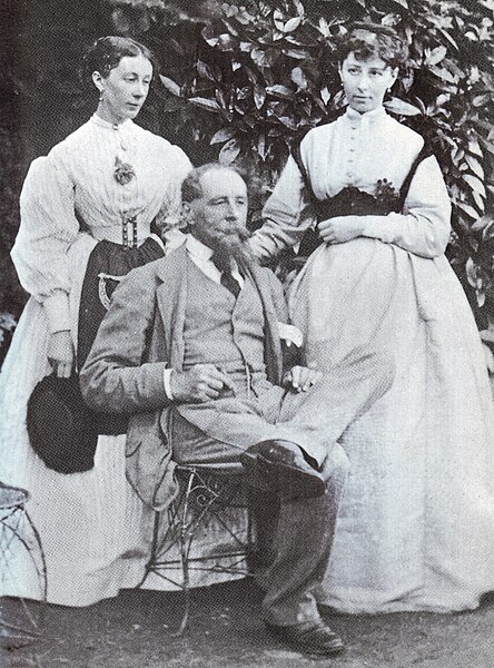 Mamie Dickens (left) with her sister Katey and their father Charles Dickens at Gads Hill Place c.1865