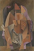1913, Femme assise dans un fauteuil (Eva), Mujer con camisola en un sillón, óleo sobre lienzo, 149,9 × 99,4 cm (59 x 39 pulgadas), Colección cubista Leonard A. Lauder, Museo Metropolitano de Arte