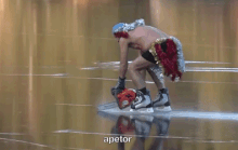 Video of a near-naked Eckhoff in ice skates propelling himself forward with a chainsaw
