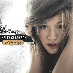 A brunette haired woman with her hands covering her ears in a grunge white background, in her right, the words "Kelly Clarkson" and "Breakaway" are printed in front of a vector scroll art.