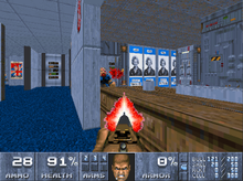 Doomguy fighting a chaingunner with the new Winchester shotgun. Pro-Thatcher propaganda is visible in the background. Thatcher's Techbase gameplay.png