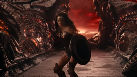 Justice League endured extensive re-writes and re-shoots that dramatically altered the final film. The above image shows Cyborg, Aquaman and Wonder Woman ready for battle in the first trailer from Zack Snyder's version before he departed the project, restored upon the release of his version. The below image shows the exact same shot from Joss Whedon's theatrical cut featuring an altered sky color and set design, as well as Cyborg and Aquaman being removed from the scene.