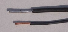 Solid aluminum branch circuit wire (top) and solid copper branch circuit wire (bottom) Solid BCW with aluminum and copper wires.jpg