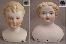 Mid-20th century labeled Japanese reproduction doll heads, made in both glazed porcelain and Parian, and in both blonde and black hair. Japanesereproductions.jpg