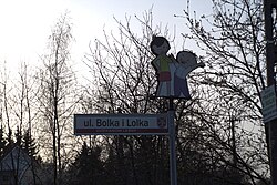 Example of the themed street signs in Dziekanów Bajkowy, on ul. Bolka i Lolka