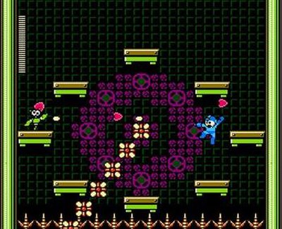 Mega Man battles mini-boss Hanabiran from Mega Man 9 in Hornet Man's stage. Note the run-and-gun and platform gameplay.