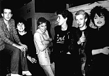 Siouxsie and the Banshees with the Cure. The two groups frequently collaborated. Siouxsie and the banshees 1979 with robert smith.jpg