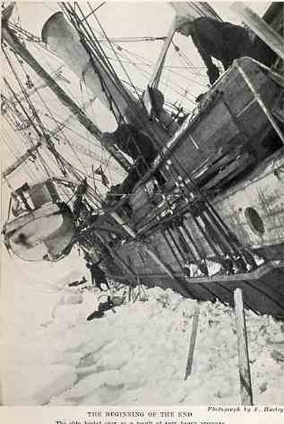 Endurance, listing at a steep angle, shortly before being crushed by the ice, October 1915; photograph by Frank Hurley