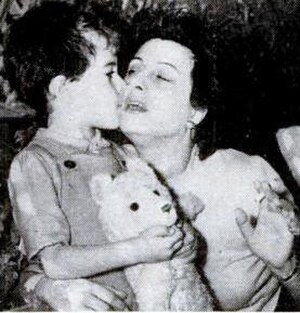 Visiting her polio-stricken son Luca at a sanatorium, c. 1947